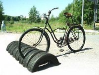 bike rack made of old tires - Buy Nothing New - www.buynothingnew.nl #ontdekwatjhebt #bnnm13