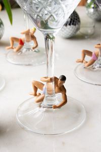 These cheeky wine glass charms feature four fellas in their swimmers, each with their names written on their bottoms for a bit of extra cheek! Ideal for adding a flirty vibe to your get-togethers...