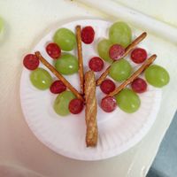 Preschool garden/tree theme snack: pretzels, grape halves and mini pepperoni