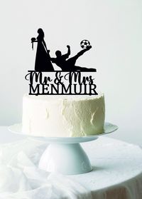 "Soccer Wedding Cake Topper, Bride Pulling Groom Cake Topper, Football Wedding Cake Topper, Soccer Player Cake Topper, Funny Cake Topper Hello. Our names Tolya and Tanya. Tanya - designer, Tolya - owner. We are pleased to welcome you to our store - \"Tanya8kDesign Studio\". We make unique toppers for you on any holidays, such as Wedding, Birthday, Mother's Day and other Anniversaries. If you you decide to decorate ycake with a designer and high-quality topper, contact us with your requests - we