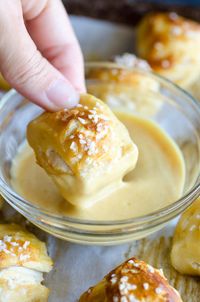 This soft pretzel bites recipe is SO easy you won't believe it! Using canned biscuits, these quickly come together in 15 minutes.