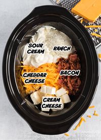 This warm Crockpot cheese dip is a gooey combo of bacon, cheddar and ranch. A favorite appetizer for parties, holidays, football, and more. #crackdip #crockpotdips #bacon #cheddar #crockpot #slowcooker #appetizer #dips #crockpotappetizers #partyrecipes #amandascookin