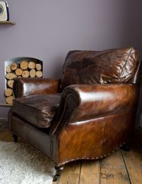 Vintage Leather Armchair... I need one for each side of our fireplace!