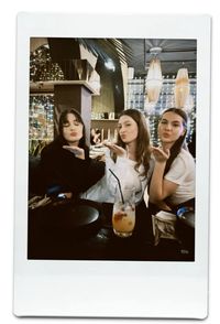 friends trio polaroid restaurant aesthetic bar night out