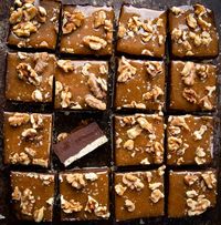 Salted Caramel Fudge Bars are a buttery shortbread crust topped with a layer of chocolate fudge, drizzled with caramel, and sprinkled with salt and walnuts. They are a decadent treat to share or enjoy for yourself!