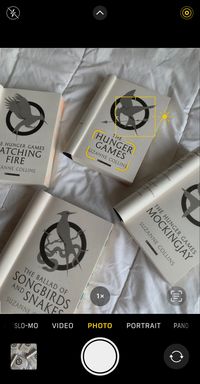 the hunger games book aesthetic; catching fire; mockingjay; the ballad of songbirds and snakes