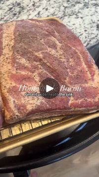 1.4M views · 41K reactions | Bacon Rub (per 5lbs of meat):
1/3 cup celery salt 
2 tbsp coarse salt
1/3 cup brown sugar
2 tbsp onion powder
2 tbsp garlic powder 
1/4 cup maple syrup
A... | By The Flake Homestead | Here is how I make homemade
bacon without any of the nitrate. This is so much better
for you than a store-bought bacon and it is better than any
other bacon you will taste in your life. Now, if you didn't
know, pork belly is what bacon is made out of and I get mine
at Costco. This ends up saving me so much money making it
myself. I start by mixing together my curing rub. I will
have all the measurements in the full recipe listed down
below and I'm just rubbing this all over the pork belly. Make
sure you coat the entire thing well. Then, you're going to
vacuum seal it in some bags,