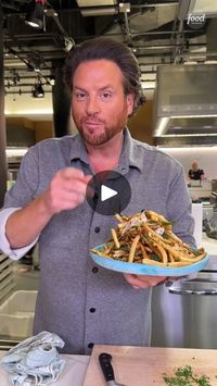 38K views · 250 reactions | How to Make Scott's Tuscan Fries | These aren’t your usual French fries 😏 Scott Conant adds fresh herbs, cherry peppers and garlic to his homemade Tuscan-style fries!

Watch Scott on the... | By Food Network | These are sophisticated Tuscan
style fries, the best fries that are not from a fast food chain. I'm going to keep the skin on. So these are washed, scrubbed,
regular Idaho potatoes. And we're going to slice them
into about a half an inch maybe. We're going to make
them perfect squares. We just want these
to be consistent so they cook all the same. Now, if we were to
take these potatoes and put them directly
inside a fryer without rinsing
them in this water, all that starch would start to
turn too brown before the potato is actually cooked. So there's a me