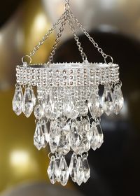 Mini Sparkle Chandelier. String up tiny chandeliers and add more glam to the baby shower.