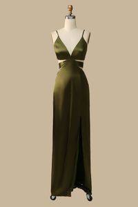 Embrace effortless elegance in our Olive Green V-Neck Cutout Maxi Dress. With its flattering V-neck and delicate spaghetti straps, this dress beautifully highlights your collarbone and shoulders. The tie-back adds a touch of femininity, while the stylish cutout design adds a modern twist. Perfect for bridesmaids or wedding guests, this dress is both stunning and versatile. Product Details   SKU: MD0971 Polyester Fabric Maxi Length Size: US 0-16. Check our Size Chart to get your correct size.  Re