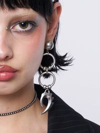 Make a statement with our Punk Goth Silver Drop Earring—the perfect mix of grunge, punk, and goth vibes. Edgy, bold, and full of indie sleaze attitude. Discover more bold alt accessories and jewellery at Minga London to complete your look!