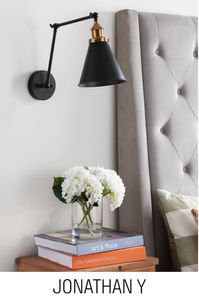 With an adjustable arm and easily focused metal shade, this sconce is the perfect solution for bedside lighting — no nightstands required! For added luxury, have your electrician install a switch below each light so you don't have to get out of bed to turn it on or off. When space is limited, they also make for excellent focused lighting, such as over bulky wall art, or above a vanity mirror. #JonathanY #HomeDecor #Lamps #DesignerLamps #ModernLighting