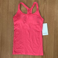 Embrace Your Movement. This Soft Tank Is Powered By Seamless Construction So You Can Move Freely Through Your Practice, Training, And Beyond. Fabric Is Sweat-Wicking And Four-Way Stretch Intended To Provide Light Support For A B/C Cup Built-In Bra Gives You Added Support And Coverage Pockets For Optional, Removable Cups Body Skimming, Hip Length Size 6 Gorgeous Sold Out Color Lipgloss New With Tags Pads Included Upon Request Look And Feel Fantastic In Lululemon! Bundle To Save On Shipping And For An Additional Discount!