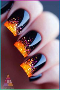 Add some sparkle to your Halloween with these glittery black nails! The bright orange and pink glitter tips make this design stand out, giving you a fun and festive look for the season. Perfect for anyone looking to jazz up their spooky style with simple Halloween nails that are easy to recreate. Save this pin for later and get more Halloween nail art inspo at nailhow.com! 🧡✨