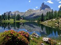 Discover the beauty of waterfalls and lakes near Cortina in the Natural Park of the Ampezzo Dolomites with hiking, trekking and climbing during your sports holidays in Italy with kids or friends.