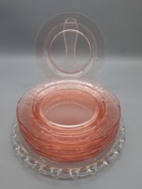 Vintage depression colored glass dessert or salad plates, 7.25". Plates are in very good vintage condition with some utensil marks. Colors available are pink and light amber. These look lovely layered in a China place setting.