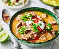 Beef curry with turmeric rice and coconut sambal