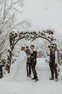 Lily and Aidan knew the possibility of snow on their NYE wedding was likely... but this winter wonderland wedding really blew it out of the water. The amount of snow during this snowy wedding was insane! A snowy wedding ceremony, snowy bridesmaid pictures, winter wedding photos in the snow... we were drenched! I loved every minute. See more from this cute and cozy winter wedding on my blog!