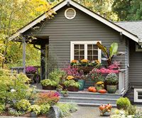 Container gardens add a welcoming feel and colorful appeal to any home exterior -- quickly and affordably: http://www.bhg.com/home-improvement/exteriors/curb-appeal/ways-to-add-curb-appeal/?socsrc=bhgpin052014instantgarden&page=6