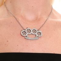 Brass knuckle necklace with signature star and rhinestone detailing “HeavenSent” logo engraving Adjustable between 16-19 inches Stainless Steel - Waterproof - Tarnish Proof LIFETIME WARRANTY - see FAQs for details PRE ORDER - SHIPS IN 4-6 BUSINESS WEEKS