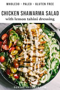 Looking to shake up your paleo dinner routine? Try this lebanese chicken shawarma salad. Mixed greens, fresh herbs, cucumber, tomato, and red onion are topped with slices of crispy oven baked chicken thighs. The marinade is fast, easy, and best of all, 100% make ahead. This is a tried-and-true whole30 recipe you'll turn to again and again! #paleo #chicken #recipes #dinner #salads #whole30 #healthyrecipes