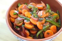 This easy salad is called 'copper penny salad' because the carrot slices resemble copper pennies! Along with tangy vinegar and rich tomato soup, this is the perfect dish to take to a weekend barbecue.