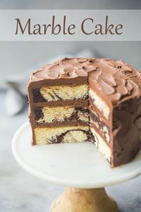 Moist marble cake from scratch: So easy to make, and we loved the chocolate and vanilla flavors swirled together! #marblecake #marble #cake #recipe #fromscratch #easy #frosting #birthday #moist #wedding #howtomake #homemade #best #chocolate #vanilla #DIY #tutorial #video #layer #simple #technique #batter #sourcream #bakingamoment