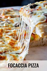 Focaccia is the best for making a unique, comforting pizza: it’s fluffy, packed with flavor and really easy to make with a no-knead recipe. #focaccia #pizza