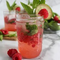 This simple and delicious recipe for raspberry mojito mocktails is made with fresh mint and lime, with a secret ingredient to replace alcohol!