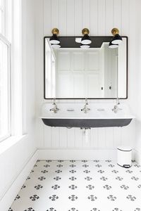 A little touch of black in the bathroom can be a sophisticated and classic addition to the scheme.  If you like the idea of some black in your bathroom but are worried it may be too heavy, read further for some ideas on adding black to a bathroom and how to successfully pull this off.