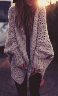 Oversized cozy knits look best originally with leggings and boots. But to spice it up a little, why not wear rolled up denim with some boat shoes for that indie/boho chic look?