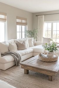 Design a cozy and inviting family room using neutral colors. Combine warm browns, soft grays, and off-whites to create a welcoming atmosphere for family gatherings. 🛋🍂✨ #NeutralFamilyRoom #CozySpaces #HomeDecor #WarmVibes