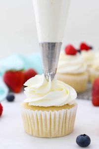 Cream Cheese Whipped Cream is a stable whipped cream recipe that is perfecting for decorating cakes and cupcakes. It's light, fluffy and much less sweet than cream cheese frosting.