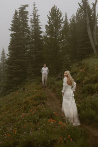 Mount Rainier National Park was so gloomy during L + H's mountain elopement, but it made for the most stunning storytelling elopement photos!! Visit the link to see how we can work together for your PNW adventure elopement. 