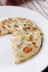 Chewy Mochi Scallion Pancakes Ingredients for pancake dough 1/3 cup (42g) cornstarch 1/3 cup boiling water 1/2 cup (104g) sweet glutinous rice flour 2 teaspoons sugar 3/4 cup (100g) all purpose flo…