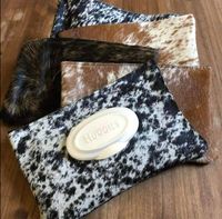 << COWHIDE BABY WIPE HOLDER >> The perfect western rodeo baby shower gift. Features REAL hair on hide. Fits 72 count wipe packs.  << Cowhide will vary. No two will be exactly alike >> RANDOM COLOR: These are made to order. Will be random based on what I have in stock at the time. YOUR COLOR CHOICE: Black/White OR Brown/White. These are the only 2 color choices at this moment. WHOLESALE IS AVAILABLE! IG: @TXSouthernBelleShop FB: TXSouthernBelleShop Website: www.txsouthernbelleshop.com