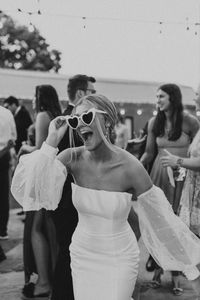 Maddie + Bryce’s wedding reception was an absolute party and heart shaped glasses are a MUST for cutie dancing reception photos!