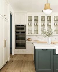 Two toned kitchen cabinets are a gorgeous design trend and we're sharing 17 of our favorite kitchens for inspiration!