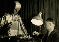 Robot Checker Player, called “Epco Robot” defeats John T. Bradford at coin operated Machine Show, held at the Hotel Sherman in Chicago, Movietone News, 1927 (bartleby-company: alfiusdebux: )