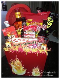 Hot. Hot. Hot.  This Red Hot Fire Gift Basket Contains Fireball Whiskey, Inferno Corn Chips, Red Hot Pork Rinds, Fireman Brew, Hot Sauce & More... Topped w/Fireman Helmet. Custom gift baskets delivered Las Vegas/Henderson, NV.  #Fireman #Firefighter #Fire #Giftbasket