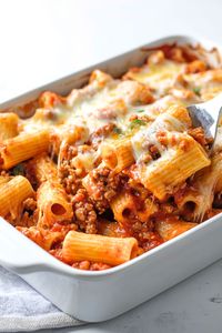 This rigatoni al forno with meat sauce is about to be your new favorite pasta bake! It's hearty, cheesy, and oh-so-satisfying!