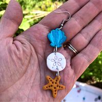 I Handcrafted These Earrings Out Of Polymer Clay And They Are Brand New And Fresh Out Of The Oven. Lightweight, Comfortable Dangle Earrings With Hooks. A Row Of Ocean Creaturesturquoise Blue Marbled Shell, A Slightly Shimmery Silvery White Sand Dollar, And A Textured Coppery Orange/Tan Starfishhang Down. There Are Some Minor Imperfections That Add Character To The Handmade Design And Make Them Truly One Of A Kind. Would Be Great As A Gift Too.