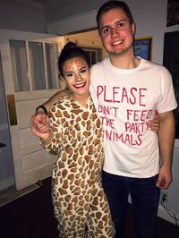 giraffe; please don't feed the party animals; halloween couple costume; makeup; zoo theme party; college