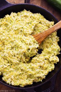 This Cheesy Zucchini Rice makes the best side to any meal.  It is so cheesy and delicious and the best ...