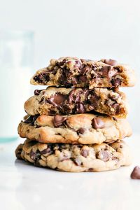 Easy and delicious bakery style chocolate chip cookies loaded with chocolate chips! These thick, soft, GIANT cookies are perfect warm out of the oven!