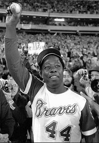 On April 8, 1974, Hank Aaron of the Atlanta Braves hits his 715th career home run,  breaking the record set by Babe Ruth in 1935.