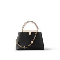 This season, louis vuitton reinvents the capucines mm bag, bringing a precious gold-tone chain adorned with colourful enamel monogram flowers to this classic bag. The polishing of each metallic flower is done by hand as is the enamel injection of the colours. A thin, adjustable and removable strap enables various carrying options.