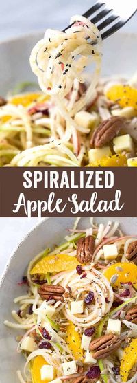 Spiralized Apple Salad with Citrus Dressing - Healthy and refreshing recipe made in only 15 minutes! Topped with oranges, pecans, cheddar cheese, cranberries, sunflower and chia seeds.