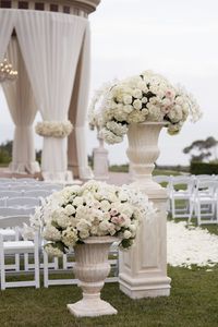 Orange County Wedding Planners Blog : Intertwined pelican hill wedding, white wedding, luxury wedding, classic wedding, timeless wedding, modern wedding, all white wedding, tall floral arrangements, wedding floral arrangements, all white flowers, elegant wedding, newport wedding, pelican hill, outdoor ceremony