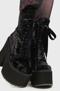 IN A PHASE.- Statement velvet platform boots.- Fern inspired embroidery.- Wine purple ribbon laces.- Includes black ribbon lace option.- Side zip.- Heel height 14cm / 5.5".- Platform height 6cm / 2.4".With KILLSTAR branding, Upper: 100% Polyester, Sole: 100% Rubber.Wipe Clean Only (with a damp cloth). Imported.